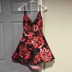 Floral dress with an open ish back.